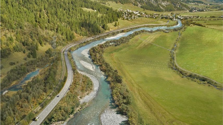 Blick von Bever Richtung La Punt: Die Engadinstrasse und die Linie der Rhätischen Bahn machen Platz für den revitalisierten Inn.          Visualisierung: Auin AG