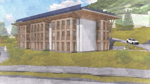 Visualisaziun dal prüm fabricat nouv da plüssas abitaziuns a Scuol cun isolaziun da strom in Engiadina. visualisaziun: Atelier Schmidt