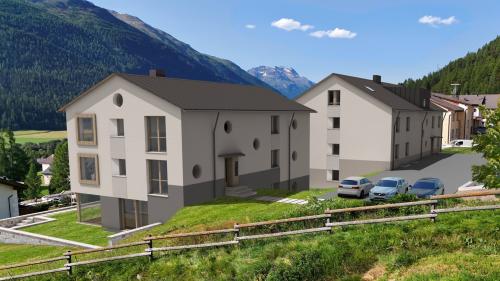 Cunter quistas duos chesas es gnieu trat inavaunt il recuors davaunt il Güdisch superiur dal Grischun. Ellas faun part d’üna surfabricaziun a La Punt  Chamues-ch da 21 abitaziuns primaras in totelmaing quatter chesas (illustraziun: mad).